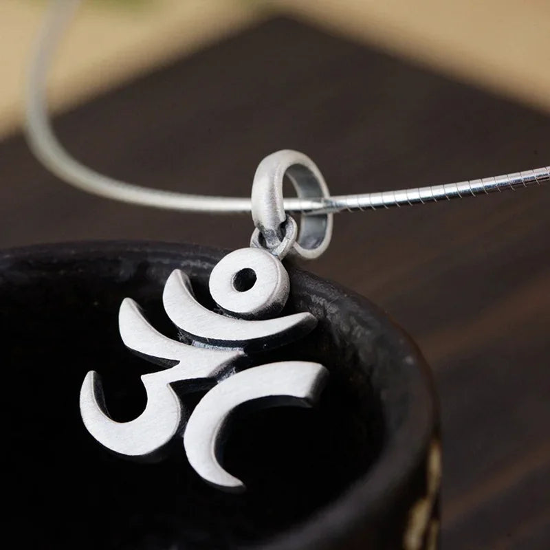 "Om" pendant in 925 silver